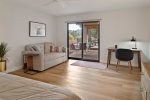 Sofa bed, work space and access to outdoor areas